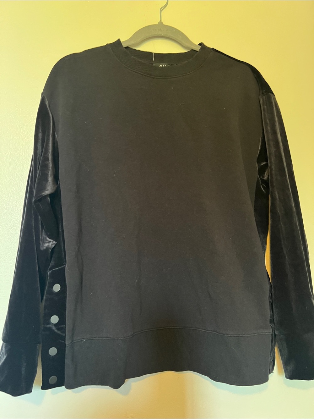 Atlleta woman’s Black Long-Sleeve Crewneck Shirt with Velvet Sleeves and back